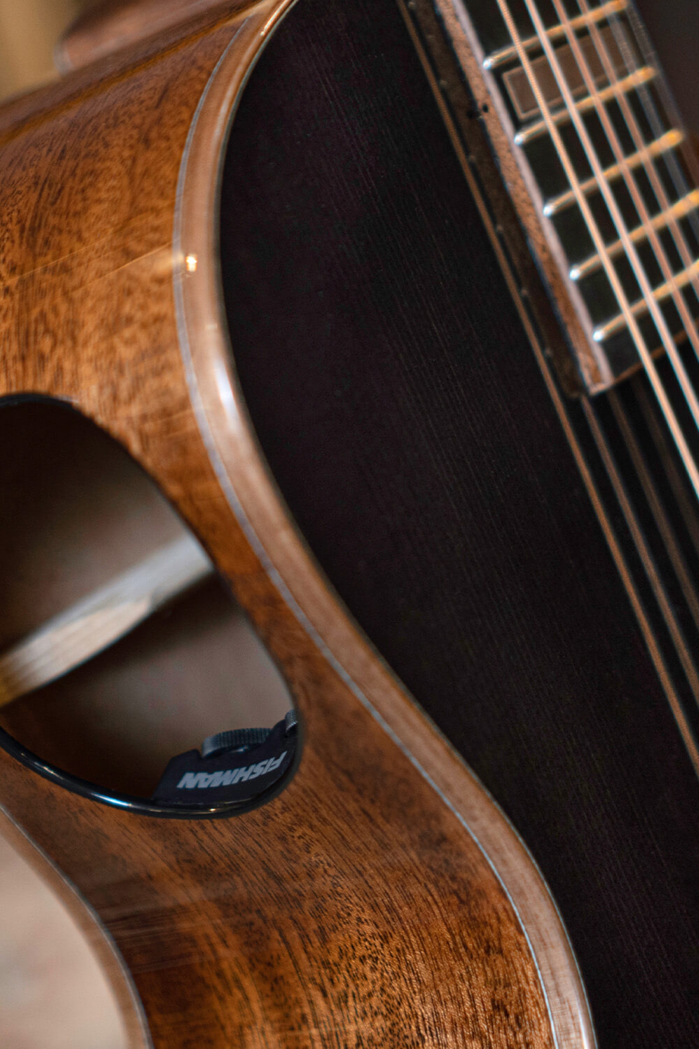 Image of Cort masterpiece modern black acoustic electric guitar lifestyle 6