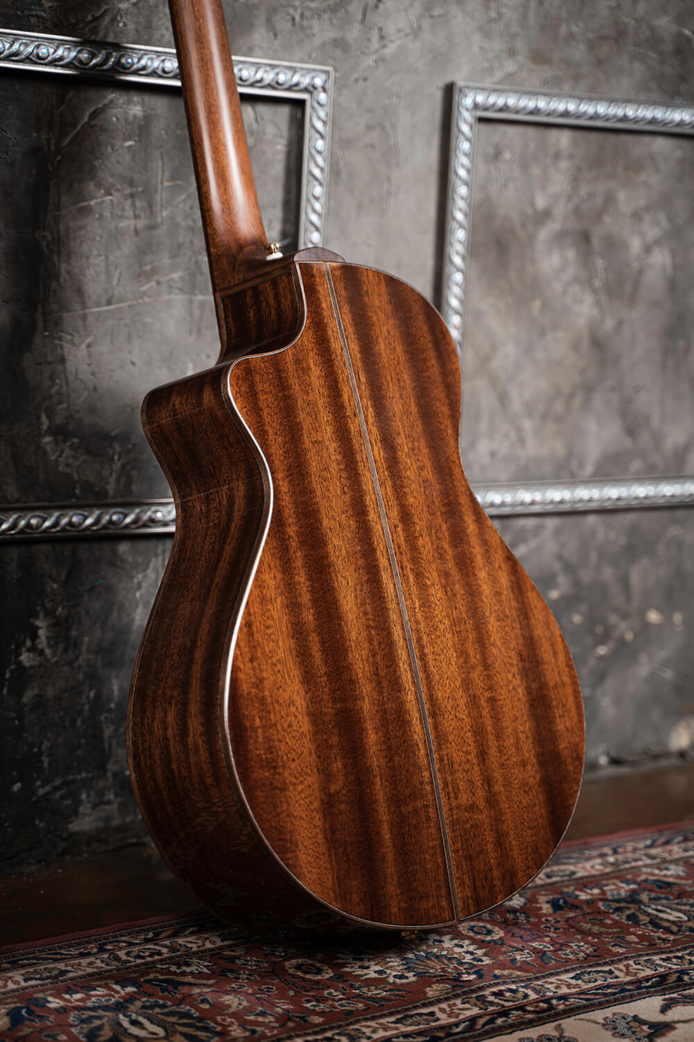 Image of Cort masterpiece modern black acoustic electric guitar lifestyle 8