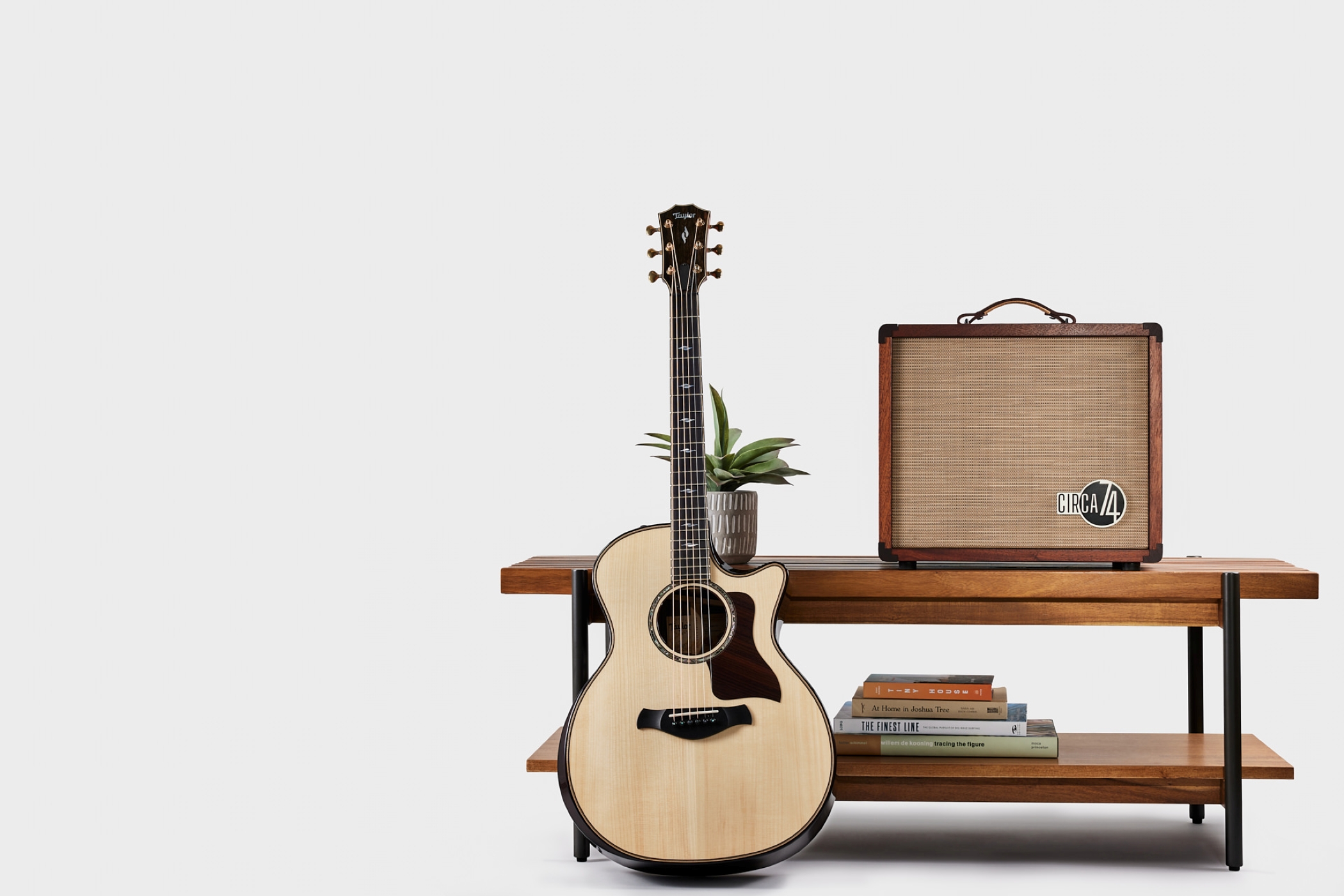 Image of Circa74 env 220427 av150 10 on white amp on table with be 814ce acoustic guitar